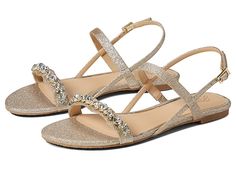 a pair of women's shoes with straps and jewel embellishments on the toes