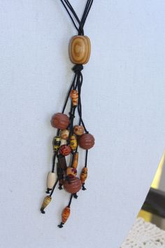 a necklace made with beads and wood