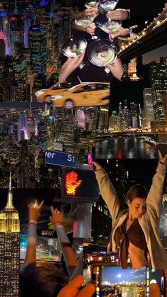 people are taking pictures with their cell phones in front of the city skyline at night