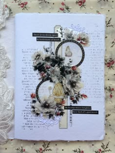 an altered photo with flowers and laces on top of a piece of paper that is laying on a doily