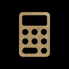 a golden calculator on a black background with some dots in the bottom right corner