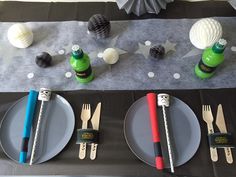 the table is set with place settings for dinner