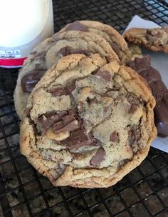 chocolate chip cookies and milk on a cooling rack