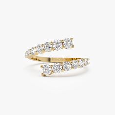 Enhance your jewelry collection with our 14K Round Diamond Cuff Ring, a unique and elegant piece featuring graduating diamonds. This gold open cuff band exudes sophistication, making it the perfect choice for a unique diamond statement ring or a memorable crossover diamond promise ring. Elevate your style with this captivating and versatile accessory that captures the essence of timeless beauty and commitment. ▶ Details   * Made to Order. * Gold KT: 14K Solid Gold (also available in 18K & Platin Luxury Platinum Open Band Jewelry, Luxury Open Band Bypass Ring For Anniversary, Diamond Bypass Ring For Anniversary, Anniversary Diamond Bypass Ring, Anniversary Diamond Bypass Ring With Open Band, Luxury Diamond Bypass Ring, Luxury Bypass Ring With Brilliant Cut, Luxury Brilliant Cut Open Bypass Ring, Luxury Open Bypass Ring For Anniversary