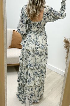 Looking for a dress that's "Swept Away" by style and comfort? Look no further than this maxi featuring a playful tiered design and trendy square neck. The printed pattern adds a touch of whimsy while the smocking at the bust and cuffs ensures a comfortable fit. With semi sheer sleeves and an all around light weight fabric, this dress is simply perfect for any occasion! 100% Polyester Jaclyn is a size 1, wearing a small. Mini Shirt Dress, Sheer Sleeves, A Dress, Long Tops, Short Tops, T Shirt Dress, Square Neck, Smocking, Sweater Top