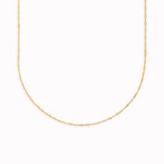 Crafted from 14k gold, this exquisite Singapore chain necklace features a twist design that catches the light with every movement.

Necklace has an adjustable length and can be worn at 16”, 17”, and 18”. Modern Twist Yellow Gold Necklace, Elegant Gold Figaro Rope Chain Necklace, Elegant Gold Adjustable Rope Chain Necklace, Elegant Gold Rope Chain Necklace With Adjustable Chain, Elegant Twisted Necklace With Adjustable Chain, Elegant Twisted Chain Necklace Gift, Elegant Twisted Gold Chain Necklace, Elegant Twisted Chain Necklace For Gift, Elegant Delicate Rope Chain Necklace