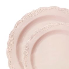 three pink plates sitting on top of each other