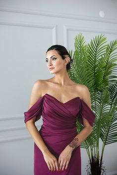 (SALE ITEM - FINAL SALE) Our beautiful Olivia midi dress is the style you will want to wear on repeat. Designed with our luxe satin fabric in a sophisticated royal blue shade, this midi dress with a sweetheart neckline and off-shoulder to show off your elegant collar bones. Its ruching fitted bodice is perfect for contouring your silhouette, and the wrap skirt unveils a daring thigh split creating an effect of endless legs. Features: Off shoulder straps Inner boning corset Front slit Zip-up back Satin Jewel Tone Bridesmaid Dresses, Plum Colored Dress, Jewel Tone Bridesmaid, Plum Midi Dress, Plum Colored Dresses, Boning Corset, Church Fits, Plum Dress, Royal Dresses