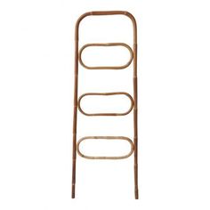 a tall metal rack with four round holes