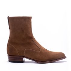 Our signature legend-inspired boot goes gaucho style in fine nap-suede. A modern mens shoe style that is as cool as it is sophisticated  made to upgrade classic mens style. Designed with a tapered shaft, we love these mens boots with slim-cut pants or denim. Both elegant and subtle these boots transition easily between casual and formal wear, day to night and are perfect to elevate those cool city outfits | Johnny Tan Boots | Ranch Road Boots | Suede Boots Mens | Luxury Boots | Tan Boot Outfits Tan Boot Outfits, Ranch Boots, Country Man, Caterpillar Boots, Cool City, Mens Leather Sandals