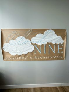 a banner hanging on the wall that says nine