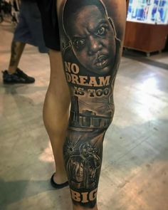 a man's leg with a tattoo on it that says, no dream is too