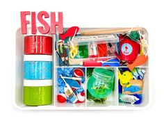 a plastic container filled with lots of different types of toys and items to play with