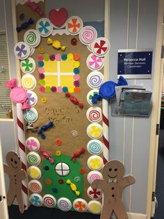 a door decorated with candy land and gingerbread man