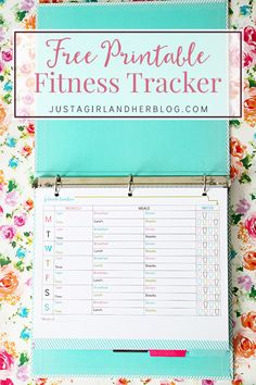 the free printable fitness tracker is displayed on a floral background