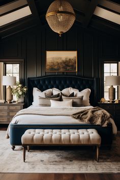 a large bed sitting inside of a bedroom on top of a hard wood floor