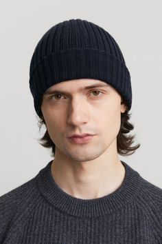 A good hat is the most effective way to fight off the cold. Our classic snug-fit ribbed beanie is knitted from 100% Extra Fine non-mulesed Australian Merino wool and made to keep its shape over time. This hat will keep you warm and stylish when the winds start whipping and the cold bites. Casual Navy Wool Hat, Fitted Wool Beanie, Classic Fitted Wool Beanie, Black Wool Beanie Cap, Navy Beanie, Merino Wool Sweater, Wool Beanie, Cashmere Wool, Cold Weather Outfits