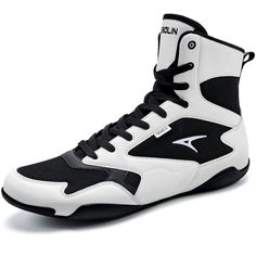 a pair of black and white high top sneakers