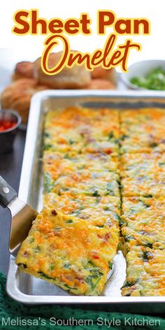 a sheet pan filled with omelet next to other dishes