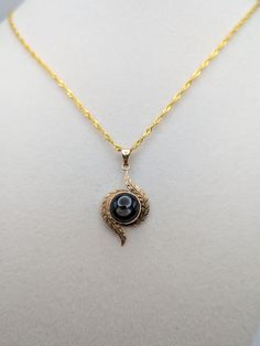 10k Gold Black Star Natural Sapphire Pendant Necklace This beautiful necklace will make a meaningful present.  Condition: Minimal signs of wear to its age Pendant properly 10k verified  Pendant: 10K Gold 32.5 mm Height 16.3 mm Width Length of chain: 18 inch 18k GF Gemstone:  Large Sapphire 9.6mm x 9.3 mm All our jewelry is properly washed and disinfected to ensure customers get clean items with every order. Comes in a beautiful gift box. Sapphire Pendant Necklace, Sapphire Cabochon, Sapphire Necklace Pendants, Sapphire Pendant, Cabochon Pendant, Beautiful Necklace, Black Star, Natural Sapphire, Beautiful Gift Boxes