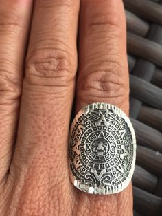 This is an adjustable Ring Made from 925 silver ( Sterling Silver) Sun Stone Ring / Aztec Calendar Ring Weight: 7.8 gr Diameter: 2.8 cm Serpentine Stone, Aztec Calendar, Sun Stone, Crystal Bags, Silver Sterling, Alpaca Wool, Adjustable Ring, Beautiful Bags, Stone Ring