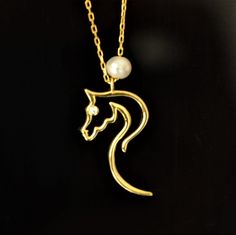 10K 14K 18K Gold Horse Necklace, Design Horse Necklace, Equestrian Pendant, Handmade Necklace, Gift For Her, Horse Necklace With Pearls, Christmas Gift, Valentines Day Gift, Mothers Day Gift, Birthday Gift In many cultures, the horse has always brought luck to people, as well as friendship and prosperity. We wish luck, friendship and prosperity to be on your side.  All jewelry in our collection are real solid gold and completely handmade accessories. The jewelry in our collection, which is an ac Elegant Yellow Gold Jewelry With Horse Design, Elegant Horse Design Necklace As Gift, Elegant Necklace With Horse Design As A Gift, Elegant Gold Jewelry With Horse Design, Gold Horse Design Pendant Necklace, Elegant Horse Design Pendant Jewelry, Gold Pendant Necklace With Horse Design, Formal Horse Design Pendant Jewelry, Elegant Formal Necklace With Horse Design