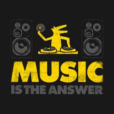 a t - shirt with the words music is the answer in yellow on black background