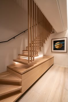 there is a wooden staircase in the house