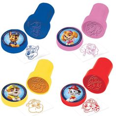 the paw patrol stampers are in various colors and shapes, including blue, yellow, red, pink, orange