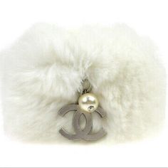 White Real Rabbit Fur Chanel Cuff Bangle In A Cream Color And Chanel Charm Chanel Charm, Chanel Cuff, Pearl Charm Bracelet, Jewelry Chanel, Chanel Jewelry, Bracelet Cuff, Pearl Charms, Rabbit Fur, Cuff Bangles