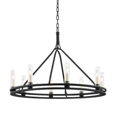 a black chandelier with six candles hanging from the center and four lights on each end