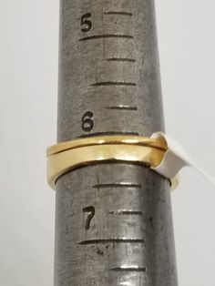 "We do not check prongs for wear or stones for looseness. All items are sold as is-noting that we are a resale shop so everything here had a previous owner! We will include flaws in the description when noted. This is one of the reasons our items are more affordable than new at a jewelry store. Vintage 14K Yellow Gold Ring Set with .20 TCW Diamonds, Size 6.25. Stamped 14K Blu-Ray inside band. Weighs 3.6 dwt. Please stop in often as we will be adding additional vintage fine jewelry beauties. Note 14k Gold Double Band Anniversary Rings, 14k Gold Anniversary Rings With Double Band, Gold Open Band Ring Stamped 14k, Gold Double Band Stackable Rings With Polished Finish, Anniversary Double Band Ring With Polished Finish, Formal Yellow Gold Stackable Rings With Double Band, Gold Double Band Rings For Formal Occasions, Formal Yellow Gold Double Band Stackable Rings, Formal Gold Double Band Ring