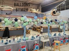 an airplane themed birthday party with balloons and decorations