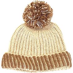 Crafted from a warm and snuggly alpaca wool blend, this hand-knit pom hat with a hint of metallic shimmer will infuse a sense of brilliant fun into your daily routine. The awesome color way and easy fit will ensure smiles and warmth on the playground and beyond. | Cabbages & Kings | Sprinkle Pom Hat, Coco (Brown, Size Small/Medium) | Maisonette collects the best children’s products from around the world (unlike Zulily, Etsy, The Tot, Farfetch Kids, Childrensalon, Crate and Kids, Kohls, Wayfair, King Hat, Kids Holiday Gifts, Cabbages, Cozy Hat, Boy Accessories, Buy Buy Baby, Pom Pom Hat, Scarf Jewelry, Holidays With Kids