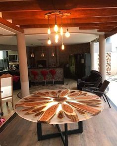 a dining room table made out of wooden slices