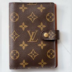 Preloved But In Great Condition Snap And Binder Rings Work Perfectly Minor Wear (As Pictured) Dry Peeling Inside Pockets (As Pictured) Pm Size: 3.9” X 5.5” Can Be Used As Passport Cover Authentic Lv Ruler Included! Inserts Not Included (But Available On Amazon). Date Code: Ca1917 Binder Rings, Louis Vuitton Brown, Louis Vuitton Accessories, Passport Cover, Authentic Louis Vuitton, Ruler, Inside Pocket, Louis Vuitton Monogram, Louis Vuitton