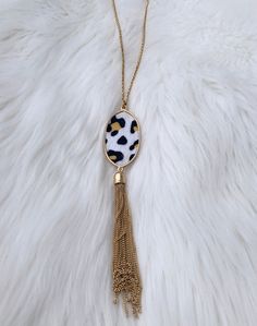 Length approximately 30 to 34 inches long Oven charm is approximately 2 inches Tassels are approximately 3 inches Trendy Leopard Print Dangle Jewelry, Louisiana Jewelry, Texas Necklace, Tassel Necklace Boho, Black Leather Necklace, Long Tassel Necklace, Trending Necklaces, Elephant Necklace, Festival Jewelry