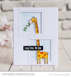 a close up of a card with a giraffe