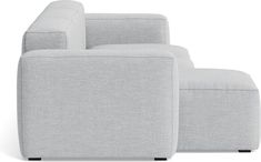 two grey couches sitting next to each other on a white surface with black legs