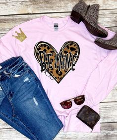 This Be Mine Leopard Heart T-Shirt is perfect for Valentine's Day! These tees are true to size Gildan unisex fit! Heart Graphic, Heart T Shirt, Valentines Day Shirts, Be Mine, Rock Revival Jean, Valentine's Day, Graphic T Shirt, Valentines Day, Graphic Sweatshirt