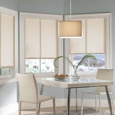 a white table and chairs in a room