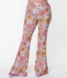 These sweet flare pants are crafted in a marvelous knit fabric that boasts green, orange, and pink retro florals throughout the lavender backdrop. Complete with zippered side pockets Available in sizes XS-4X while supplies last. Lavender Backdrop, Macys Pants, Spring Floral Prints, 1960s Outfits, Pink Retro, Orange And Pink, Model Pictures, Spring Floral, Green Orange