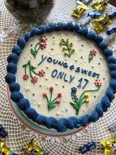 a blue and white cake with the words you're sweet only 17 on it