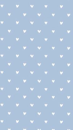 a blue and white wallpaper with hearts in the shape of heart shapes on it