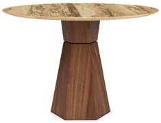 a round wooden table with an abstract design on the top and base, against a white background