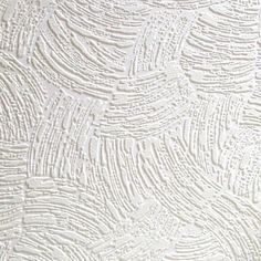 white textured wallpaper with an abstract design