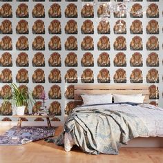 a bed room with a neatly made bed and a wallpaper that has an image of a lion on it