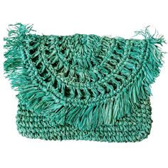 Made from turquoise raffia with a frilly flap and zipped closure, the "Bona Chic" clutch is lined with turquoise cotton. This boho-chic style clutch is the perfect accessory for your summer evenings. Height: 23/25 cm Length: 28/30 cm Homemade All our products are handmade, they may have slight imperfections, varied a little in dimensions and colors. Gift wrapping and accompanying message possible. We also do wholesale sales to professionals. My Bliss Home offers you free delivery from 100€. Bohemian Clutch For Vacation, Green Rectangular Clutch For Beach, Blue Bohemian Clutch For Festival, Handmade Bohemian Clutch For Spring, Handmade Bohemian Spring Clutch, Beach Clutch With Tassels, Bohemian Woven Clutch For Vacation, Green Beach Clutch For Summer, Green Summer Beach Clutch