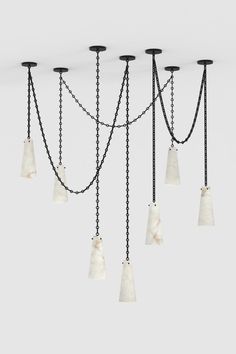 a bunch of lights that are hanging from the ceiling in some kind of lighting fixture