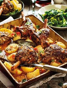 meat and potatoes in a casserole dish on a table